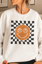 Sudadera con cara feliz y calabaza a cuadros