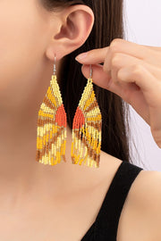 Pendientes de cuentas estilo boho con forma de rayos solares