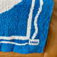 Pacific Row Plush Throw - Swell Blue