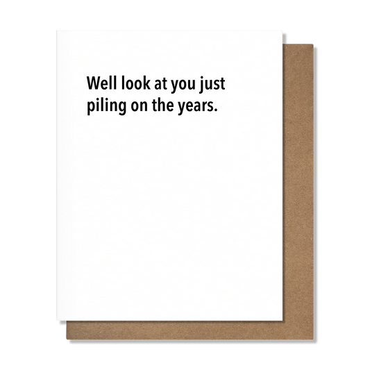Piling On The Years - Birthday Card