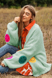 Le cardigan en tricot Fuzzy Smile