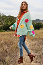 Le cardigan en tricot Fuzzy Smile