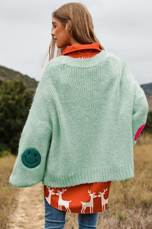 Le cardigan en tricot Fuzzy Smile